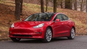 The Cheapest Tesla Model Electric Vehicle - Red Color