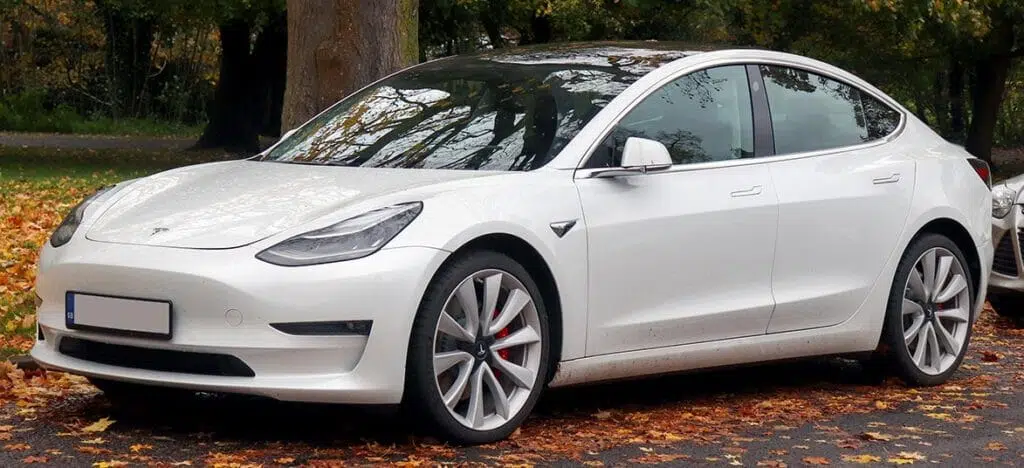 The Cheapest Tesla Model Electric Vehicle - White Color